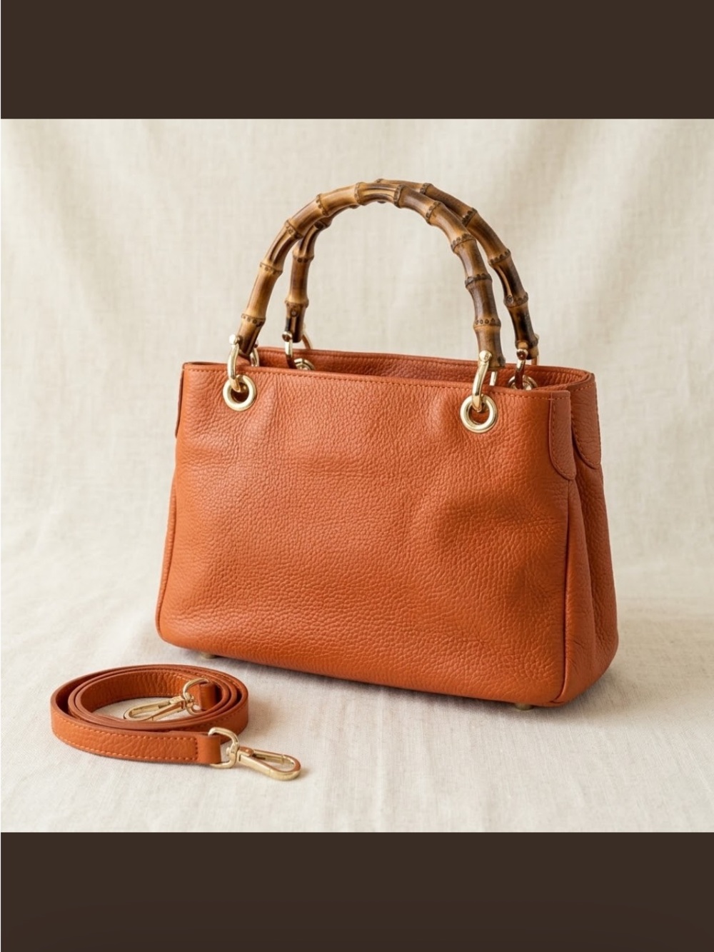 UNO ALLA VOLTA Orange Pebbled Italian Leather Bamboo Handle Satchel Crossbody